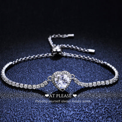 Moissanite heart bracelet with minimalist silver setting