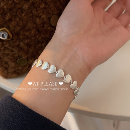 S925 Sterling Silver Brushed Heart Bracelet – Interlinked Elegance