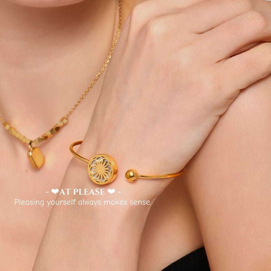 Stacked bracelets with coffee cup flat lay