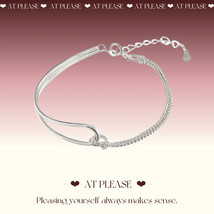 Layered silver chain bracelet with asymmetrical links